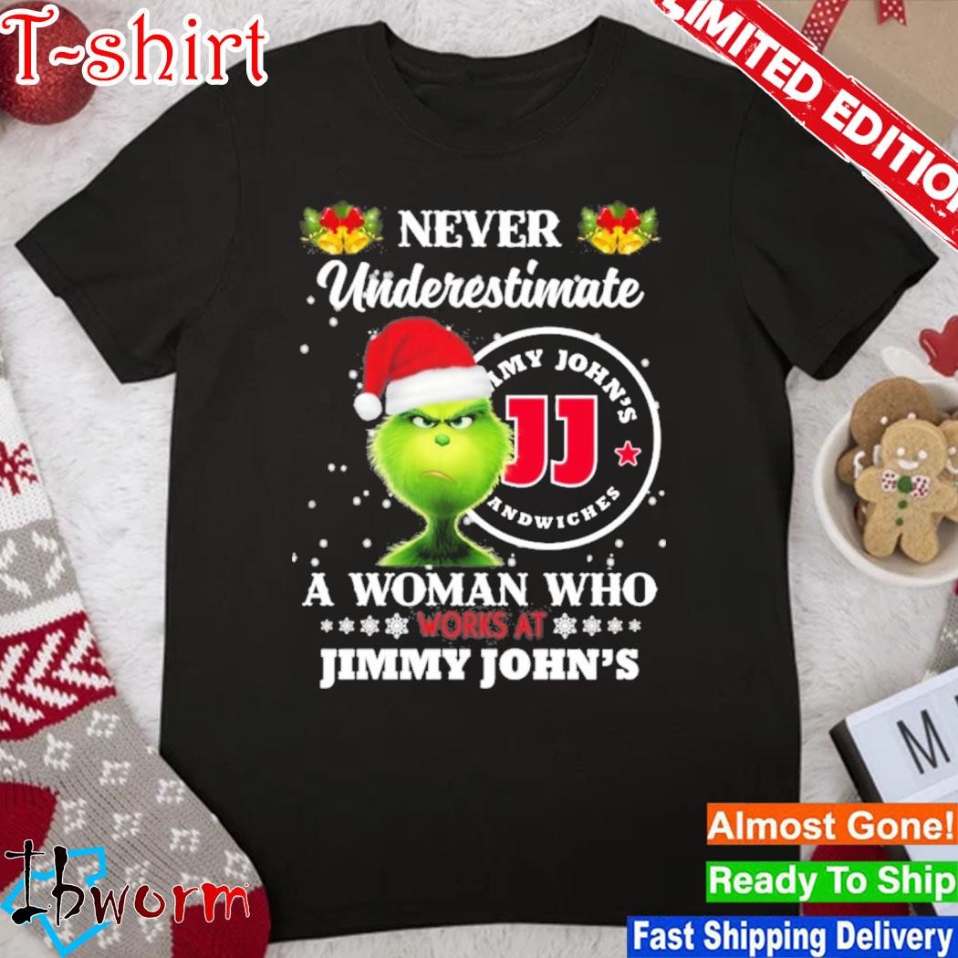 Official grinch hat santa never underestimate a woman who works at Jimmy john's logo christmas shirt
